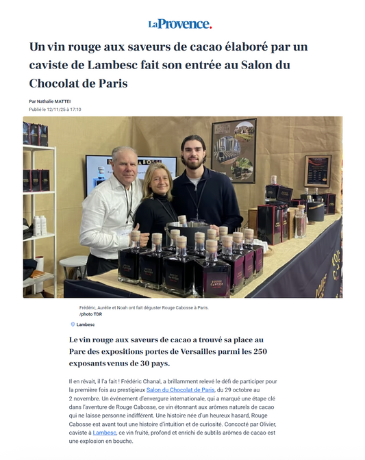 Article de La Provence montrant Fréderic Aurélie et Noah derrière leur stand Rouge Cabosse au salon international de chocolat 2025 à Paris. 